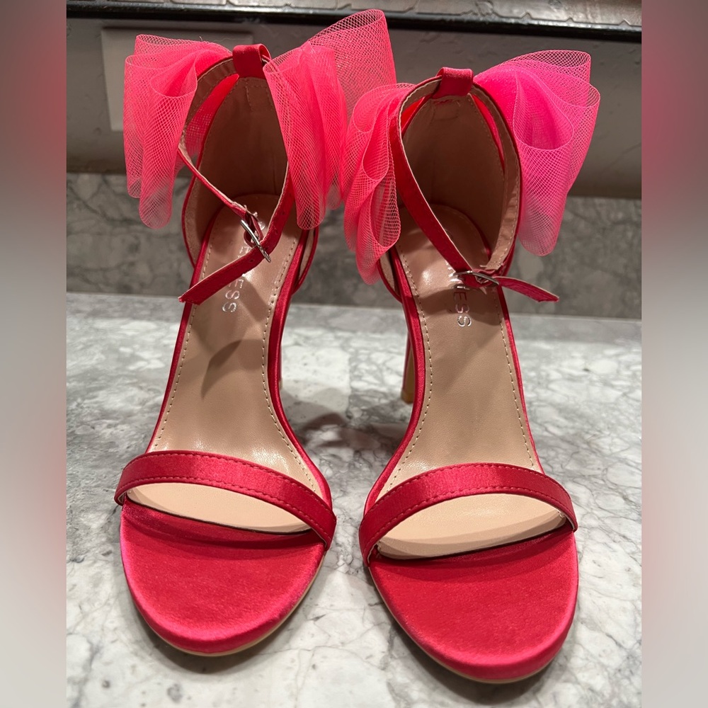 Shop Avara Heels with Pink Tulle Bow. Never been worn